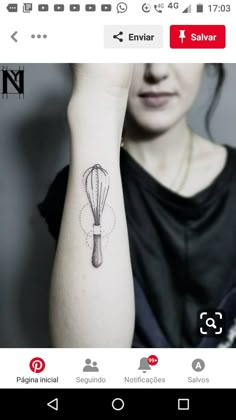 a woman's arm with a tattoo on it that has an image of a whisk