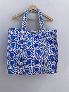 cotton print Bag The Indian Hand Block Printed Cotton Quilted Women's Handbags from Rajasthan India. This Handbag is completely Indian Printed on good quality cotton. Cotton quilted Jhola Bag made by Indian Artisans, this cotton quilted shopping bag is totally unique and multi purpose. Use this for your grocery or as a travel bag. Perfect to suit all. Item :- Cotton Handbag Material: Quilted Cotton Fabric Color - rainbow Pattern : Block Print Style: Tote Bag, Handle Bag, Shoulder Bag Size in Inc Bag Marketing, Blue Floral Print Vacation Bags, Blue Square Shopping Bag, Blue Floral Print Shopping Bags, Floral Print Double Handle Shopping Bag, Blue Floral Print Travel Bag, Floral Block Print, Cotton Handbag, Quilted Tote Bags