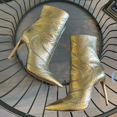 Size 37. Alexandre Birman Gold Snake Boot. Good Used Condition Formal Gold Closed Toe Boots, Gold High Heel Boots With Reinforced Heel, Designer High Heel Gold Boots, Gold Boots With Reinforced Heel And Closed Toe, Gold Almond Toe Heels For Fall, Designer Gold Pointed Toe Boots, Snake Boots, Snake Print Boots, Python Snake