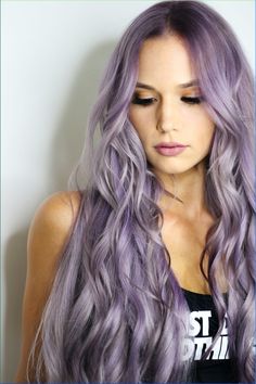 Like many unnatural hair colors, not every shade is created equally, rather, it’s all about customizing the colorful look to complement your skin tone and undertones. If you have fair skin with cool undertones, try a pastel purple hair color, like lilac. The pale hybrid of purple is one of the coolest colors for hair that looks feminine and fanciful.   #pastelhaircolor #purplehaircolor Hair Color Pastel, Lavender Hair, Hair Color Purple, Tape In Hair Extensions, Hair Transplant, Hair Color Dark, Clip In Hair Extensions, Purple Hair