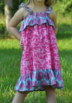 Learn how to sew a girl's sundress easily with this sewing project. This is a beginner-friendly sewing pattern that has no zippers or buttons. The ruffles along the chest and the hemline makes this girls dress pattern a favorite in her summer dress wardrobe. Girls Shift Dress Pattern Free, Tiered Baby Dress Pattern, Girl Dress Pattern Pdf, Strapless Ruffle Dress