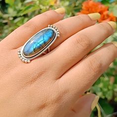 Handmade labradorite  bohemian ring  , you can wear this ring as a party wear ring .. Title -labradorite stone ring  Stone color - blue  Stone shape - oval Material - Sterling silver 925 Note - This is natural stone so shade may be little bit different .. we are giving you best quality rings on best price .. contact us for more quantity Blue Labradorite Bohemian Jewelry, Bohemian Blue Labradorite Jewelry, Bohemian Rings With Raw Stone, Bohemian Jewelry With Large Moonstone, Bohemian Moonstone Jewelry With Large Stone, Bohemian Moonstone Ring With Large Stone For Gift, Bohemian Moonstone Ring With Large Stone As Gift, Bohemian Turquoise Open Ring With Natural Stones, Bohemian Large Stone Moonstone Ring