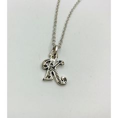 "Beautiful necklace with initial K in a silver tone. Tiny black gems throughout the letter K. 18\" length Condition: Pre-Owned Good Gently loved!  Thank you for visiting our shop!" Silver Metal Initial Necklaces, Silver Initial Pendant Necklace Nickel Free, Silver Metal Initial Pendant Necklace, Silver Initial Metal Necklaces, Silver Initials Metal Necklace, Silver Metal Necklaces With Initials, Silver Monogram Charm Necklace With Initial Pendant, Silver Monogram Initial Pendant Charm Necklace, Elegant Silver Metal Initial Necklace