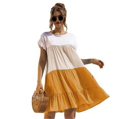 Yellow Colorblock Ruffle Mini Dress Casual Beach Dresses With Contrast Color, Chic Summer Dresses With Contrast Color, Casual Dresses With Contrast Color For Beach, Spring Mini Dress With Contrast Color, Chic Color Block Dresses For Day Out, Casual Summer Ruffle Dress With Layered Hem, White Color Block Dress For Day Out, Casual Color Block Mini Dress For Summer, Summer Mini Dress With Short Sleeves And Splicing