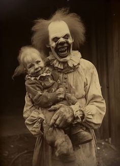 an old photo of a creepy clown holding a child