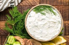 an assortment of vegetables and dip in a bowl