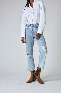 Feel nostalgic in these 90's style distressed denim pants. Keep your look casual with a loose fitting tee and sneakers, or style them up with a blouse and heels. Loose Fit Distressed Fabric Belt Loops Hits above the Ankle *These pants run a little small. We recommend you order a size up. Trendy Distressed Cropped Jeans For Everyday, Trendy Ripped Cropped Jeans For Everyday, Casual Everyday Ripped Cropped Jeans, Trendy Ripped Cropped Jeans In Medium Wash, Relaxed Fit Cutoff Cropped Jeans With Five Pockets, Trendy Ripped Medium Wash Cropped Jeans, Relaxed Fit Jeans With Frayed Hem In Recycled Denim, Relaxed Fit Recycled Denim Jeans With Frayed Hem, Trendy Ripped Light Wash Cropped Jeans