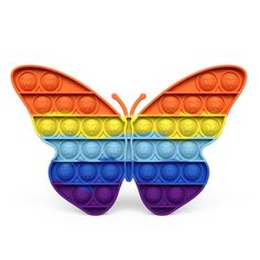 a colorful butterfly made out of legos on a white background with the colors of rainbow