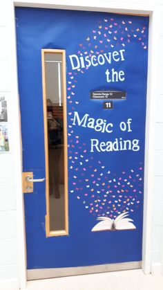 a blue door with the words discovering the magic of reading on it