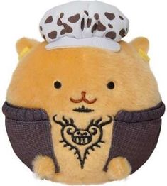 a stuffed animal with a chef's hat on it's head and eyes