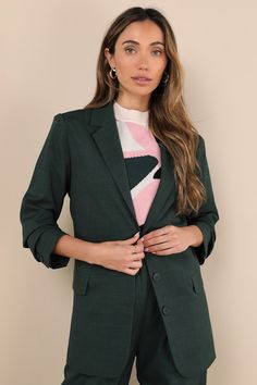 From brunch to the boardroom, prepare for compliments along the way in the Lulus Bold Poise Dark Green Button-Front Blazer! Lightweight stretch-woven fabric shapes this chic blazer with a collared neckline, notched lapels, and long sleeves with lightly padded shoulders and button cuffs. The slightly oversized bodice features a trio of functional buttons at the center, accompanied by two, functional flap pockets. Kick pleat at back. Pair with the matching pants for a complete look! Fit: This garm Green Office Blazer With Hidden Button Closure, Green Blazer With Hidden Buttons For Office, Green Button-up Workwear Blazer, Green Button-up Blazer For Work, Green Button-up Blazer For Business Casual, Green Blazer With Button Closure For Business Casual, Green Business Casual Blazer With Button Closure, Green Jacket Women, Chic Blazer