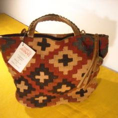 This Is A Brand New Wool Kilim Rug Purse Or Tote In Natural Rust/Brown/Tan Colors With A Touch Of Charcoal Grey. Tote Handles And Detachable Shoulder Strap Are Both In Saddle Tan Tooled Leather. This Is A Really Nice Purse With A Good Feel And Natural Look. Leather Piping Around Bottom. Leather-Trimmed Top. Fully Lined In Cotton With A Side Zipper Pocket. Has A Leather Tassel And An Agate Stone Attached To A Leather Loop. Meant To Be A Good Luck Stone. Also Has A Key Ring With Leather Tab Attach Brown Bags With Braided Handles For Fall, Multicolor Leather Handle Bags For Fall, Multicolor Bags With Leather Handles For Fall, Fall Multicolor Bags With Leather Handles, Rug Purse, Lv Clutch, Orange Purse, Slouchy Bag, Grey Tote