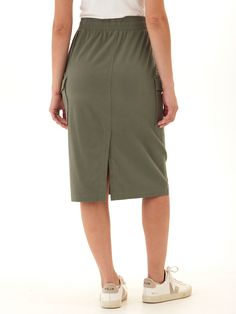 Experience ultimate comfort and style with the Wynne Stretch Twill Cargo Midi Skirt. Its stretchy fabric and flattering fit provide all-day wearability, while the thick elastic waistband offers a secure fit. Versatile Stretch Cotton Skirt, Casual Fitted Cargo Skirt With Elastic Waistband, Casual Stretch Pencil Skirt, Fitted Knee-length Cargo Skirt With Lining, Green Skirt With Elastic Stretch Waistband, Casual Cotton Stretch Cargo Skirt, Casual Fitted Knee-length Cargo Skirt, Casual Stretch Lined Skirt, Casual Long Fitted Cargo Skirt