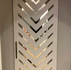 the door is decorated with metallic strips