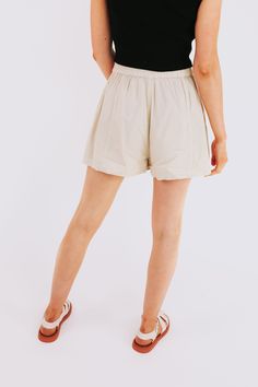 Unleash those legs in FREE PEOPLE's Get Free Poplin Pull On Shorts! With an elastic waist, these shorts are perfect for a comfortable and playful summer look. Say goodbye to restrictive waistbands and hello to effortless style! Details Elastic waist Sizing Approximate measurements: SIZE LENGTH/INSEAM WAIST XSmall 14/13" 27" Small 15/14"﻿ 30"﻿ Medium 15.5/15"﻿ 32"﻿ Large 16/15.5"﻿ 33"﻿ XLarge 17/16" 34" Fabric has stretch in the waistbandModel is 5’10 wearing small Material 62% Cotton 32% Viscose Vacation Paperbag Waist Shorts With Elastic Waistband, Vacation Paperbag Waist Shorts With Elastic Band, Vacation Shorts With Elastic Paperbag Waist, Summer Cotton Short Bloomers, Summer Cotton Bloomers Short Style, Comfortable Summer Shorts With Short Leg, Casual Summer Bloomers With Elastic Waistband, Summer Cotton Bloomers With Elastic Waistband, Paperbag Waist Bottoms With Built-in Shorts For Day Out