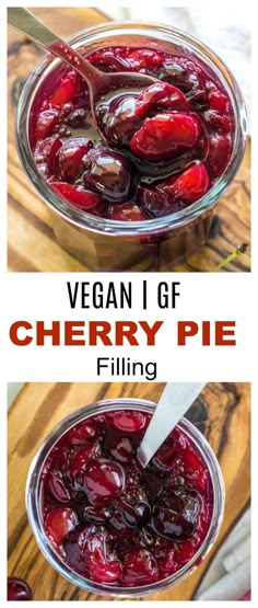 a bowl filled with cherries sitting on top of a wooden table next to a spoon