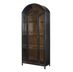 an arched glass door cabinet with wooden shelves