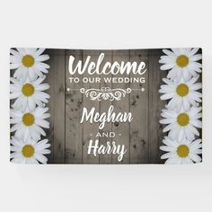 a wooden background with daisies and the words welcome to our wedding