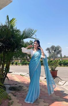 College Saree Look, Blue Saree Aesthetic, Sarees For Girls Farewell, Blue And White Saree, Saree For Girls Farewell, Farewell Sarees Colleges, Indian Jumkas, Georgette Saree Party Wear