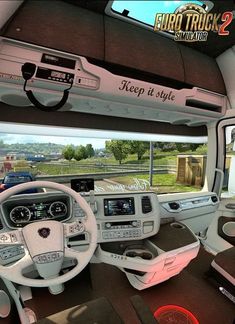 the interior of a truck with many items on display in front of it's windows