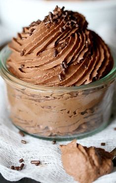 a glass bowl filled with chocolate ice cream