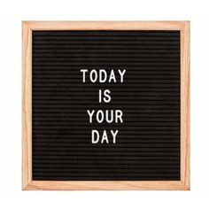 a black and white sign that says today is your day