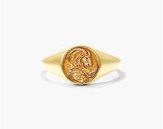 14K Yellow Gold Capricorn Zodiac Signet Ring. Capricorn is symbolized by the sea goat which represents the marriage between the mind and the soul. The goat embodies the steadiness, ambition and intelligence, while the fish tail represents passion, intuition and connection. Inspired by mythological imagery, our Zodiac Signet Ring collection is the perfect talisman to channel this energy. Spiritual Yellow Gold Tarnish-resistant Signet Ring, Yellow Gold Spiritual Signet Ring, Gold Zodiac Sign Rings As Gift, Symbolic Gold Zodiac Rings, Capricorn Ring, Sea Goat, Dress Reference, Buying Gold, Golden Goddess