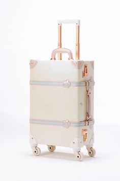 MATERIAL: Pu Leather /strong & waterproof & lightweight. Lining with our branch brand - Sarah Face. TELESCOPIC LUGGAGE HANDLE: With the click of a button, our three-tier aluminium telescopic handle extends and securely clicks into place to adjust height at 85, 95 or 105cm. Inside handle system allows for a bala