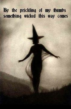 the silhouette of a woman wearing a witches hat and holding her arms out in front of an overcast sky