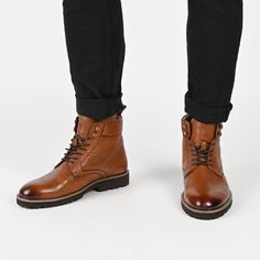 Meet the Simeon boot from Thomas & Vine – a versatile wardrobe essential designed for both style and comfort. Crafted from genuine leather, these lace-up boots effortlessly elevate any outfit, whether you're dressing up with button-ups or keeping it casual with vintage band tees. Featuring a round-toe silhouette, cushioned collar, 6 mm Tru Comfort Foam™ footbed, and a 1 1/4-inch block heel, these boots offer a perfect blend of fashion and support for every occasion. • Round-Toe • Lace-Up • Cushi Winter Leather Lace-up Chukka Boots, Winter Boots With Front Lace-up Fastening And Round Toe, Fall Season Leather Footbed Ankle Lace-up Boots, Fall Ankle Lace-up Boots With Leather Footbed, Fall Lace-up Ankle Boots With Leather Footbed, Plain Toe Lace-up Boots For Business In Fall, Business Lace-up Plain Toe Boots For Fall, Business Lace-up Boots With Plain Toe For Fall, Brown Plain Toe Combat Boots For Winter