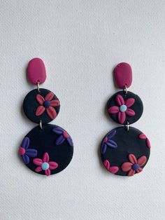 These adorable floral earrings are absolutely perfect! They add a pop of color, but are also finished nicely with stainless steel findings that are completely nickel free! They would also make a fantastic gift! Trendy Nickel-free Flower-shaped Earrings, Trendy Nickel Free Flower Shaped Earrings, Whimsical Multicolor Flower Charm Earrings, Adjustable Multicolor Earrings With Flower Charm, Adjustable Multicolor Flower Charm Earrings, Handmade Cute Multicolor Flower Earrings, Cute Handmade Multicolor Flower Earrings, Playful Handmade Multicolor Flower Earrings, Playful Multicolor Handmade Flower Earrings