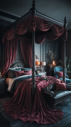 a bedroom with a canopy bed covered in red velvet