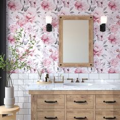 a bathroom with pink flowers on the wall and white tile flooring, along with a wooden vanity