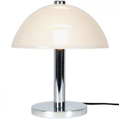 a lamp that is sitting on top of a table with a cord attached to it