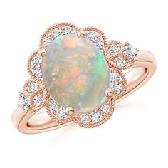 an opal and diamond ring in rose gold