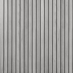 a black and white photo of wood slats