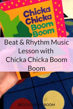 a person holding up a book with the title beat and rhyth music lesson with chick