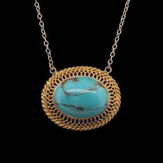 This is part of Chairish’s Fine Jewelry assortment.  A fine repurposed Victorian period 14K gold pendant with a natural polished turquoise in the center.  The bezel set stone is surrounded by a gold filigree frame.  The chain is marked 14K and is the adjustable type which allows you to wear it two inches shorter.  Condition is excellent.  The back of the pendant also has an applied small plaque stamped 14K.  It dates c. 1890.  Dimensions: 18" or 16", Pendant: Width: 1", Length: 3/4", Weight:  5. Gold Oval Turquoise Gemstone Necklace, Antique Oval Turquoise Necklace, Antique Turquoise Oval Necklace, Elegant Yellow Gold Turquoise Necklace With Cabochon, Elegant Yellow Gold Turquoise Cabochon Necklace, Victorian Turquoise Filigree Jewelry, Gold Turquoise Pendant Necklace With Cabochon, Elegant Oval Turquoise Necklace With Large Pendant, Elegant Gold Turquoise Necklace With Oval Pendant