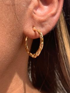 18kt Gold Filled Hoop Paperclip Hoops Hoop Size: 26mm Width: 2mm Clasp: Push back Material: 18 Karat Gold Filled, Hypoallergenic. Tarnish Resistant. Gold-filled does not de-laminate or peel like Gold plated Jewelry nor does it tarnish as readily as silver. Generally speaking, gold filled is better quality and will have a much longer lasting color than plated jewelry. We recommend keeping abrasive chemicals away from the jewelry for the items to last. Thank you for visiting and supporting our sma Gold Hoop Jewelry With Gold Chain, Gold Hoop Earrings With Gold Chain For Gift, Everyday Link Jewelry For Pierced Ears, Yellow Gold Hoop Earrings With Gold Chain For Gift, Gift Yellow Gold Hoop Earrings With Gold Chain, Yellow Gold Link Earrings For Everyday, Tarnish Resistant Link Earrings, Gift Yellow Gold Hoop Earrings, Everyday Yellow Gold Link Earrings