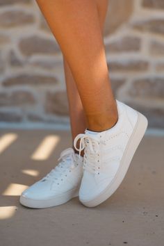 Designed with a sleek, all-white appearance, the Mara Leather Sneaker is a must-have for any fashion-forward individual. Made with high-quality faux leather, these shoes provide comfort and style. Elevate any outfit with these versatile and durable sneakers. True to size 1" platform White Platform Sneakers With Vulcanized Sole For Everyday, Trendy White Platform Sneakers With Perforations, White Sneakers With Perforated Toe Box For Spring, White Spring Sneakers With Perforated Toe Box, Spring White Sneakers With Perforated Toe Box, Casual Faux Leather Sneakers With Round Toe, Trendy Everyday Platform Sneakers In Synthetic, Trendy Synthetic Platform Sneakers For Everyday Wear, Everyday Trendy Synthetic Platform Sneakers