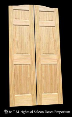 two wooden doors are shown against a black background