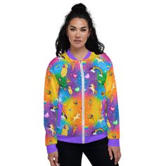 Add a little zing to your wardrobe with this vibrant All-Over Print Bomber Jacket. Wear it on a basic t-shirt, or layer it on top of a warm hoodie—it’ll look great either way. With a brushed fleece inside, and a relaxed unisex fit, this Bomber Jacket is just the stuff of the dreams, so be quick to grab yourself one! • 100% polyester • Fabric weight: 6.49 oz/yd² (220 g/m²), weight may vary by 5% • Brushed fleece fabric inside • Unisex fit • Overlock seams • Sturdy neck tape • Silver YKK zipper • Fun Multicolor Winter Outerwear, Fun Multicolor Hooded Outerwear, Fun Winter Streetwear Outerwear, Playful Cotton Outerwear For Streetwear, Playful Fall Streetwear Tops, Casual Multicolor Outerwear With Drawstring Hood, Playful Long Sleeve Streetwear Outerwear, Casual Rainbow Top For Winter, Casual Rainbow Tops For Winter