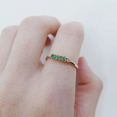 14K Gold Tiny Emerald and Diamond Eternity Band Ring - 14k Emerald Wedding Band for Women - 14k Stacking Emerald Ring - 14k Emerald Jewelry Item Detail Material : 14K Gold , Stone Metal : 14K Solid Gold  Stone : Emerald & Diamond  Size : 3mm &  2mm Shape: Round  Finish : 14k Yellow gold , 14k Rose gold , 14k White gold  Occasion:- Christmas Gift Ring, Mother's Day Gift, Valentine's Day Gift Ring, Lover gift Ring, Heart gift Ring, Promise Ring, Proposal Ring, Couple's Gift Ring, Anniversary Gifts Emerald Jewelry Ring, Emerald And Diamond Band, Promise Ring Proposal, Emerald Wedding Band, Wedding Band For Women, Ring Proposal, Green Emerald Ring, Ring Heart, Emerald Wedding