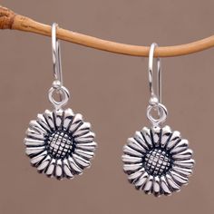 Balinese artisan Suar Dwipayana handcrafts these lovely dangle earrings from sterling silver. Each earring features a beautifully detailed daisy that hangs elegantly from a sterling silver hook. Known as the birth flower of April the daisy represents new life and new beginnings in many cultures around the world. Cultures Around The World, Flower Dangle Earrings, Silver Feather, Silver Dangle Earrings, Sterling Silver Dangle Earrings, Unique Jewelry Designs, Pearl Earrings Dangle, Birth Flower, Silver Pieces