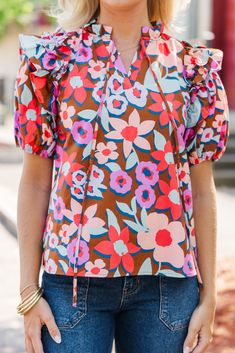 This floral blouse is such a must have! That print is super bold and fun! Plus, we love that ruffled detailing along the shoulders! V-neckline Short bubble sleeves Ruffled detailing Floral print No stretch Payton is wearing the small. Trip Outfits, Mint Julep Boutique, Make A Plan, Mint Julep, Brown Floral, Model Fits, Personal Marketing, Floral Blouse, Dress Accessories