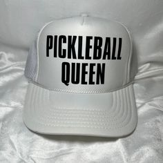 Pickleball Queen Trucker Hat White Trucker Hat with Black details 5 Panel Trucker Hat  Foam Front  Mesh Back   Adjustable back  Perfect for: Pickleball Pickleball gifts Mother's Day Baby shower Summer hat Boat hat Trendy hat Patchy hat Custom Trucker Hats Unique Truckers Sports Hat Novelty Baseball Cap One Size Fits Most, Adjustable Hats For Sports Events, Adjustable Fun Hats For Sports Events, Letter Print Snapback Hat, One Size Fits Most Bucket Hat For Sports, One Size Trucker Hat With Visor For Sports Events, Adjustable Cap For Sports Events, Trucker Hat With Visor For Baseball Season, One Size Snapback Hat For Baseball Season