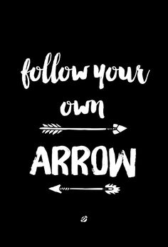 the words follow your own arrow are drawn in white ink on a black background with an arrow