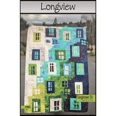 the cover of longview quilts, featuring an image of a multi - colored house