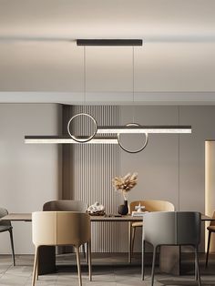 an elegant dining room with modern furniture and lighting