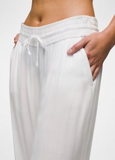 An Effortless Wide-leg Pant Ready To Become Your Go-to Cover-up For Beach Days. Versatile Stretch Wide Leg Pants For Vacation, Summer Vacation Harem Pants With Elastic Waistband, White Beachwear Pants With Elastic Waistband, Spring Summer Beach Harem Pants, Spring Beach Harem Pants, High Waist Harem Pants For Summer Vacation, White Harem Pants For Spring Vacation, Summer White Relaxed Fit Harem Pants, Versatile White Pants For Vacation